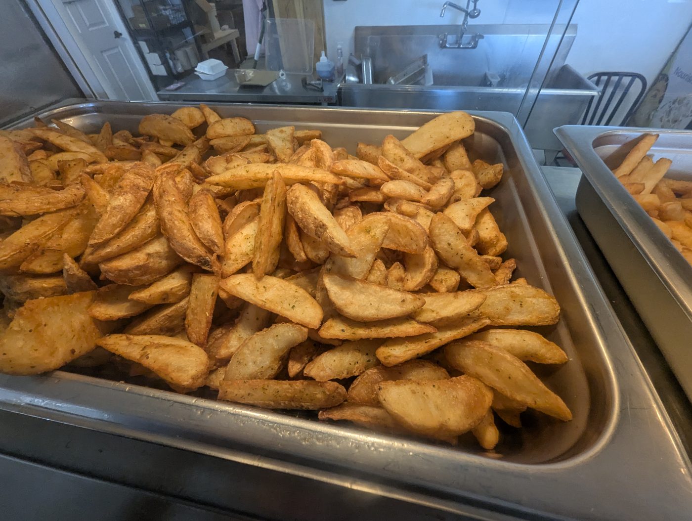 Seasoned potato wedges